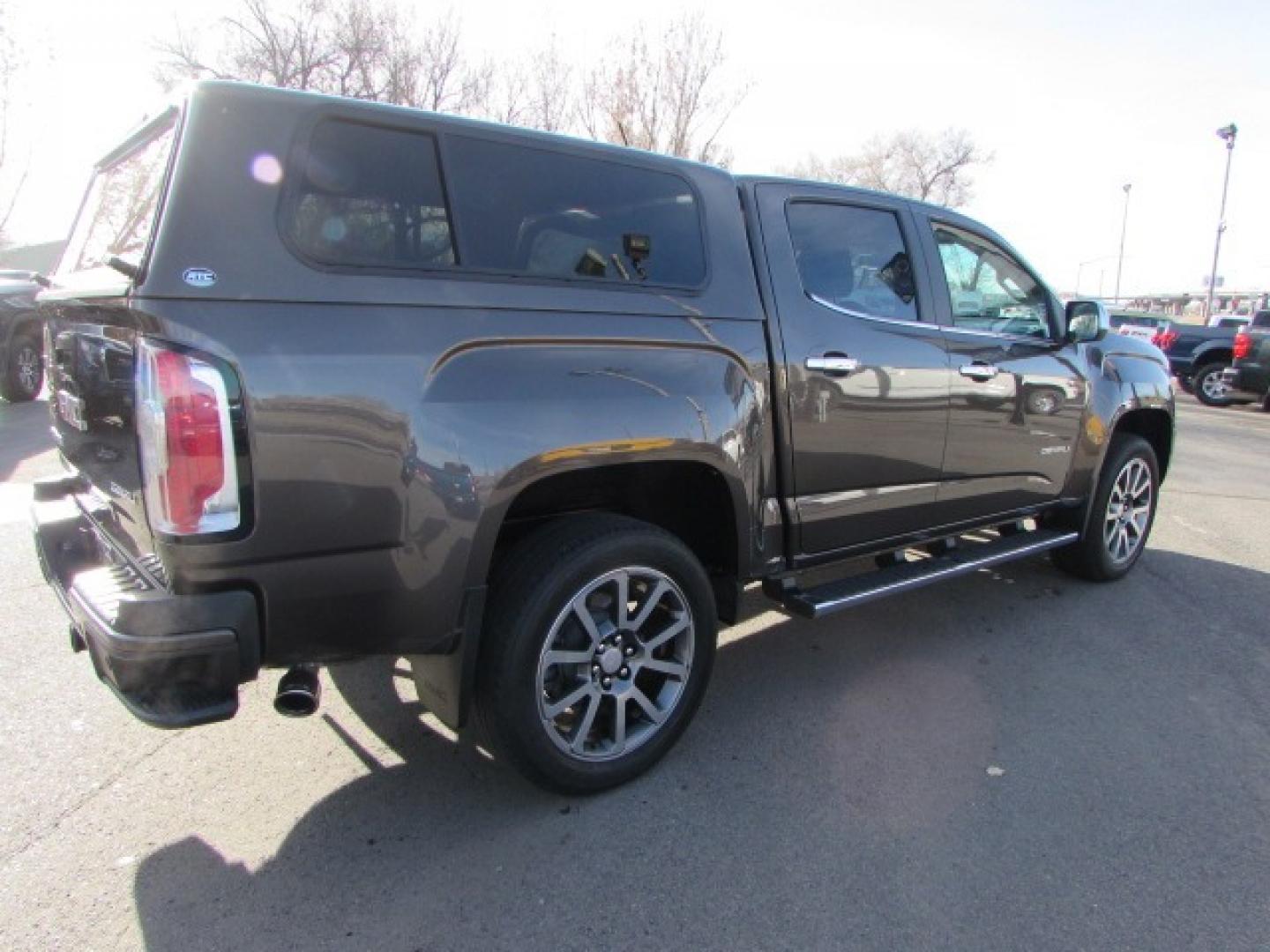 2019 Smokey Quartz Metallic /Gray Leather GMC Canyon Denali Crew Cab 4WD Long Box (1GTG6EEN6K1) with an 3.6L V6 DOHC 24V engine, 8A transmission, located at 4562 State Avenue, Billings, MT, 59101, (406) 896-9833, 45.769516, -108.526772 - Photo#4